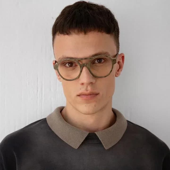 Nina Mûr Rodrigo eyeglasses in the Saturn wooden-eyewear colorway, model shot at Gazal Eyecare in Roswell, GA