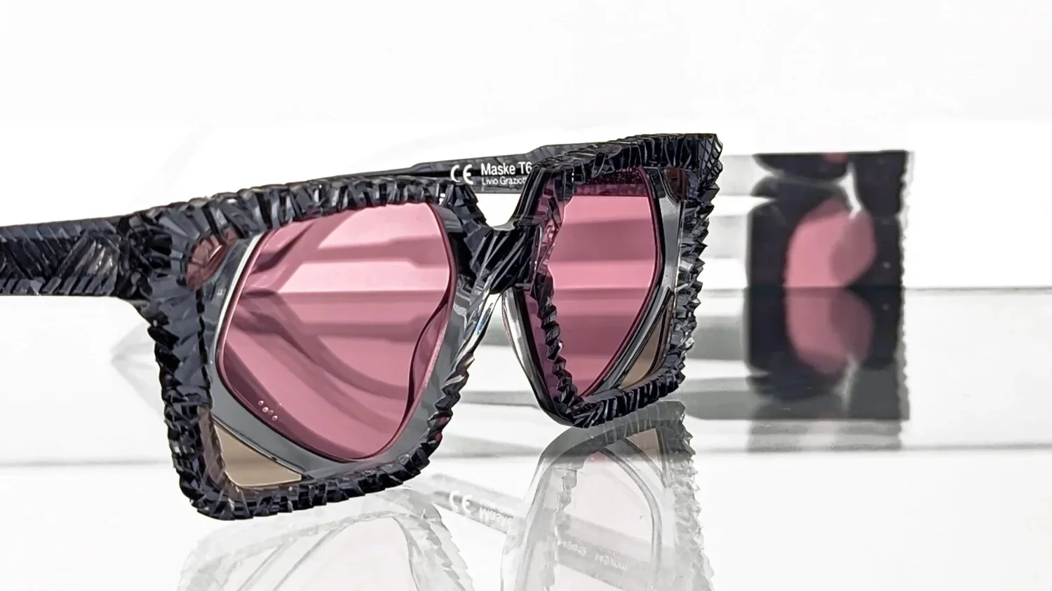 Kuboraum mask-style eyewear with a bold experimental lens tint